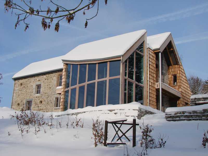 Transformation d'une petite ferme en une habitation unifamiliale