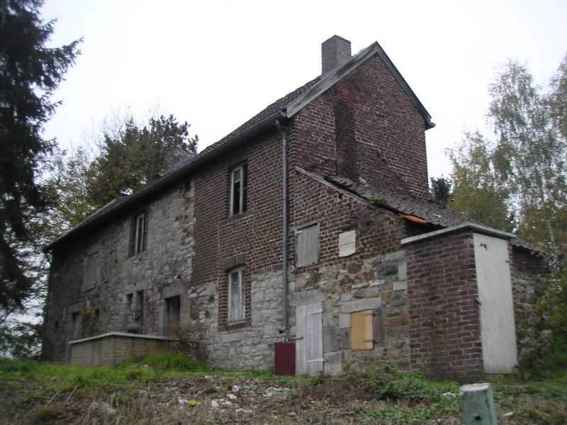 Transformation d'une petite ferme en une habitation unifamiliale