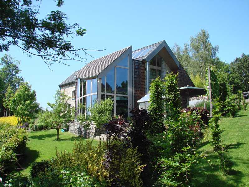 Transformation d'une petite ferme en une habitation unifamiliale